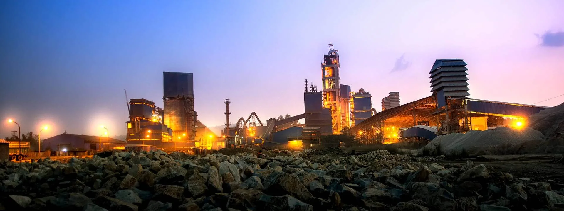 Hongshi Shivam Cement plant lit at dusk